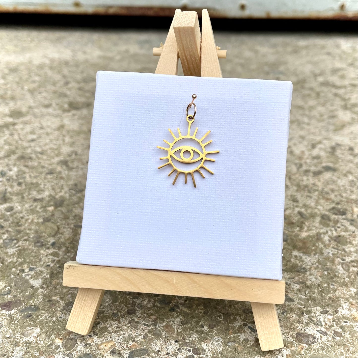 Charm -Sonne mit Auge- Gold