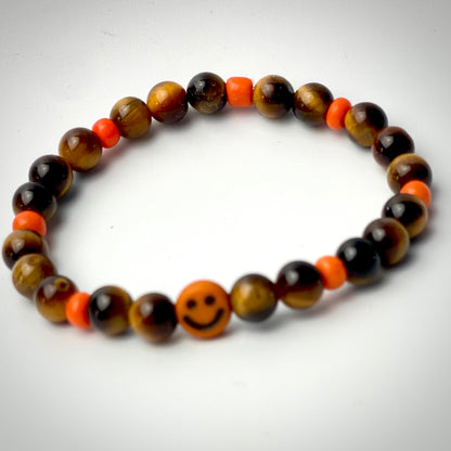 Armband Tigerauge „Mutmacher“ Eltern-Edition mit 6 mm Perlen und fröhlichem Gesicht