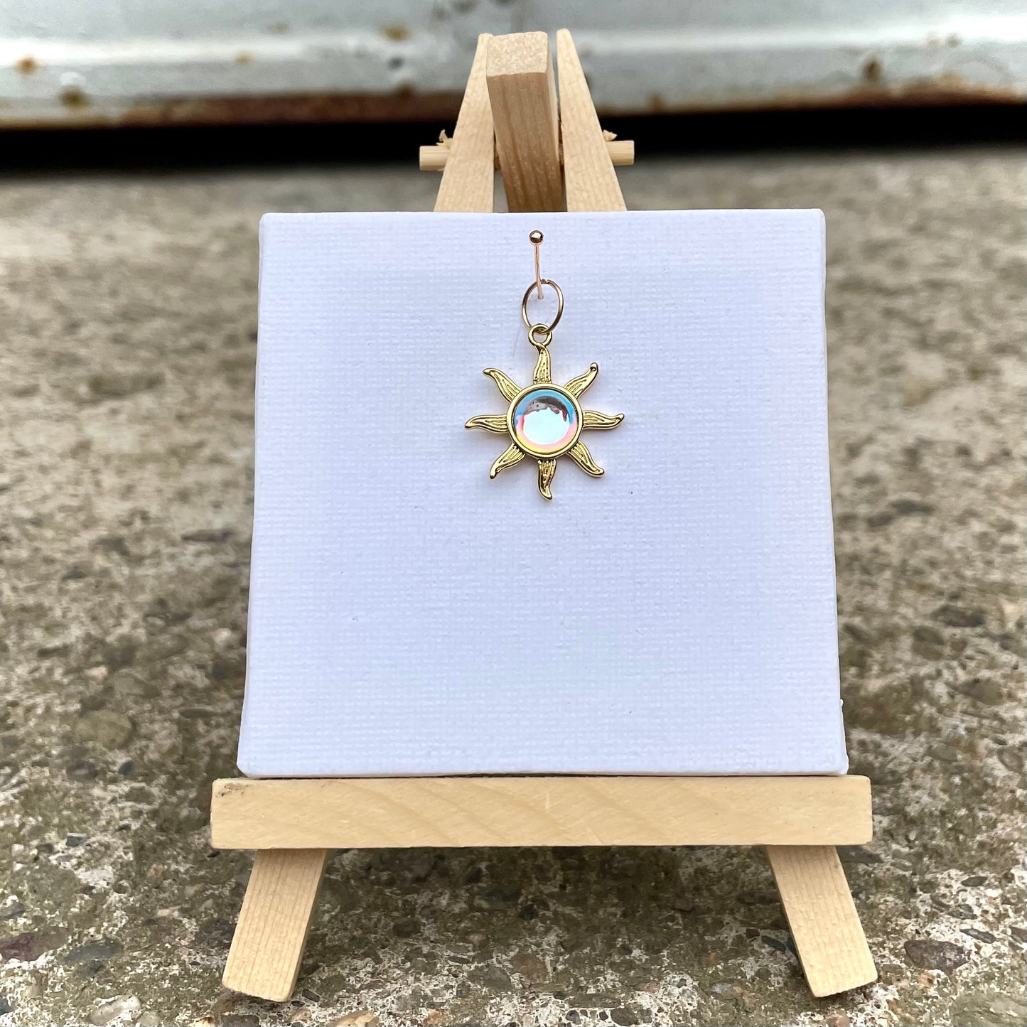 Charm -Sonne mit Glasstein- Gold